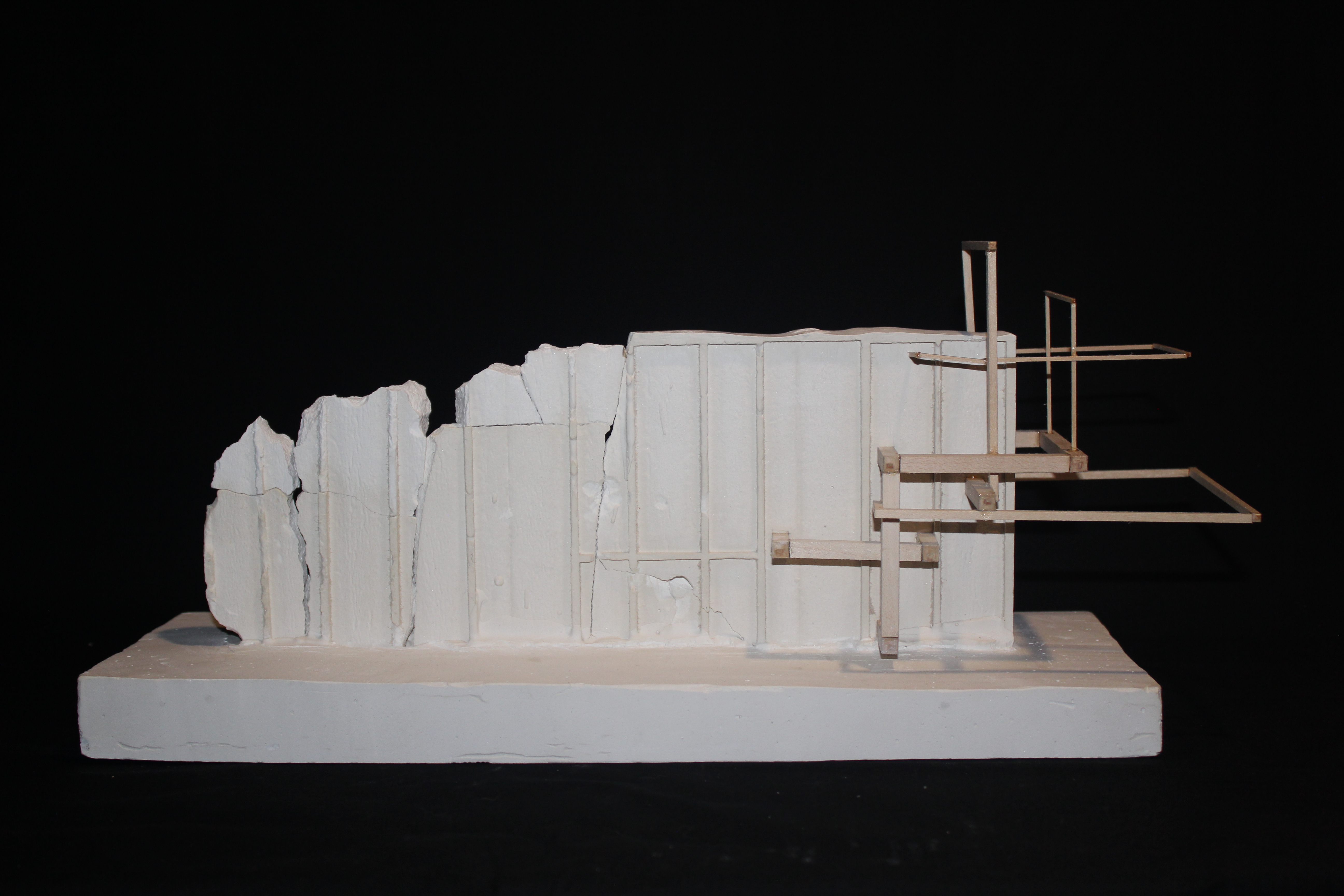 Brewery District Arts Center concept model — fragmented plaster wall with timber framework.